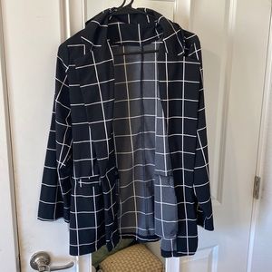 Black and white, thin blazer. Only worn once. Medium.